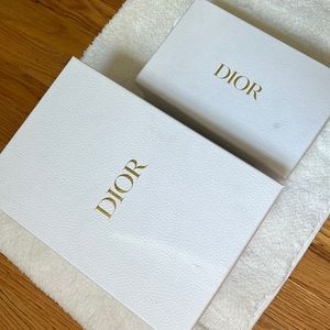 Dior boxes. One box fits a pair of Dior sandals and one box from a clutch wallet